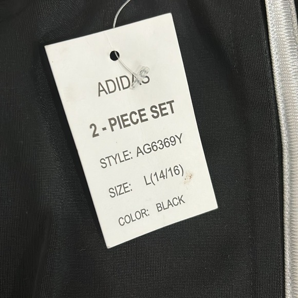 COPY - Selling a new never use green and black camouflage tracksuit for 50 Doll… - Picture 2 of 2